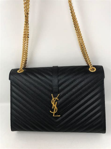 ysl bag black gold|YSL Bag gold hardware.